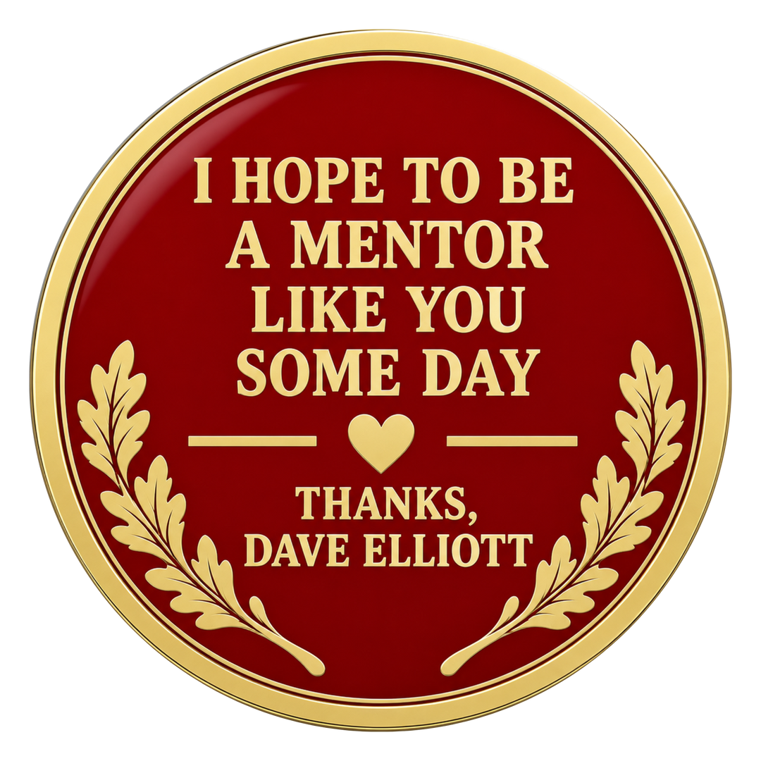 A round red and gold plaque or sticker with the text 'I HOPE TO BE A MENTOR LIKE YOU SOME DAY THANKS, DAVE ELLIOTT' and gold laurel branches on a white background.